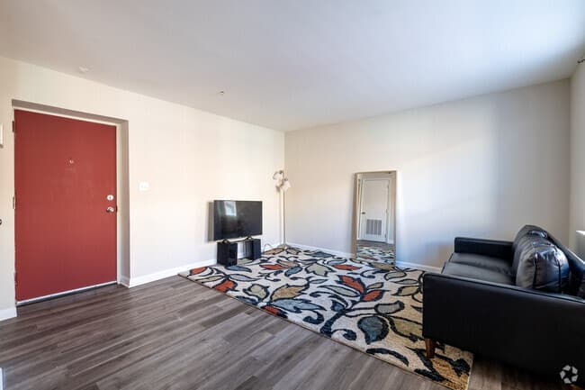 Apartment interior with large windows and natural light